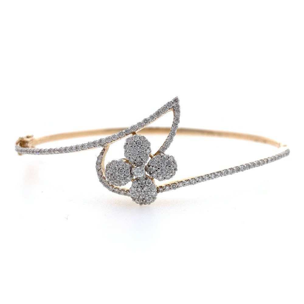 18kt / 750 yellow gold floral diamo...