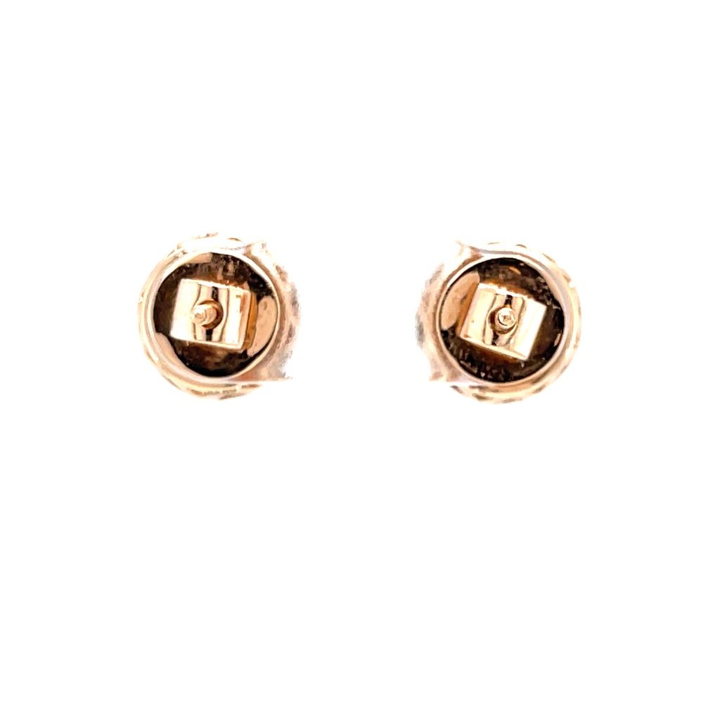 Solitaire studs with halo diamond border in pressure set 0top98