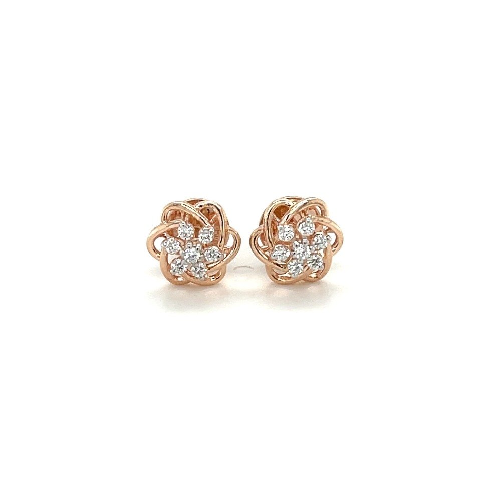 Dainty diamond stud earrings in 14k...
