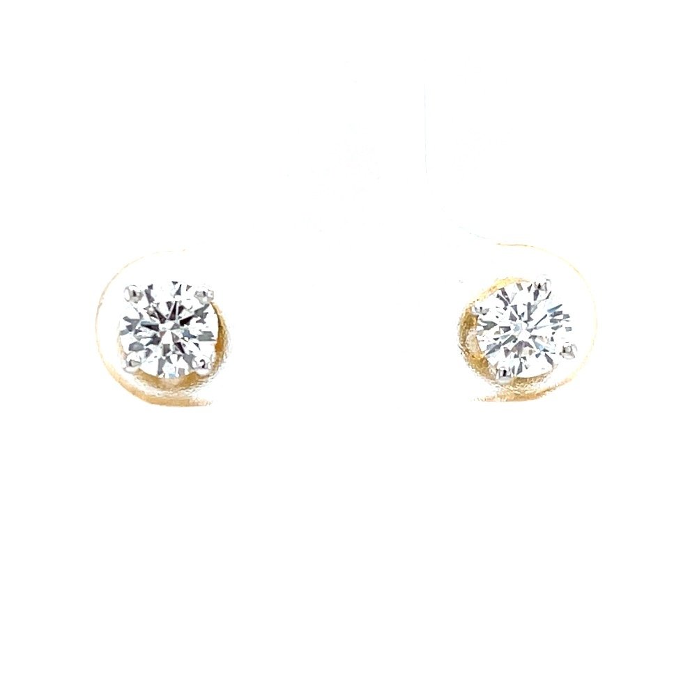 Single diamond studs in four prongs...